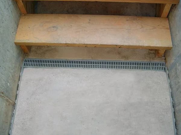 TrenchDrain™ Surface Water Drainage System - Grated surface drainage for basement problem areas